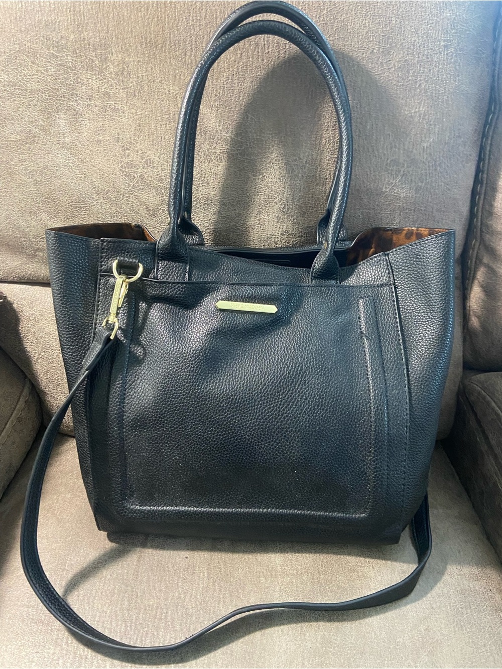 Steve Madden Leather black purse with leopard lining inside